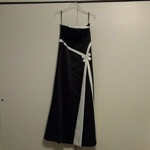 Black strapless gown.